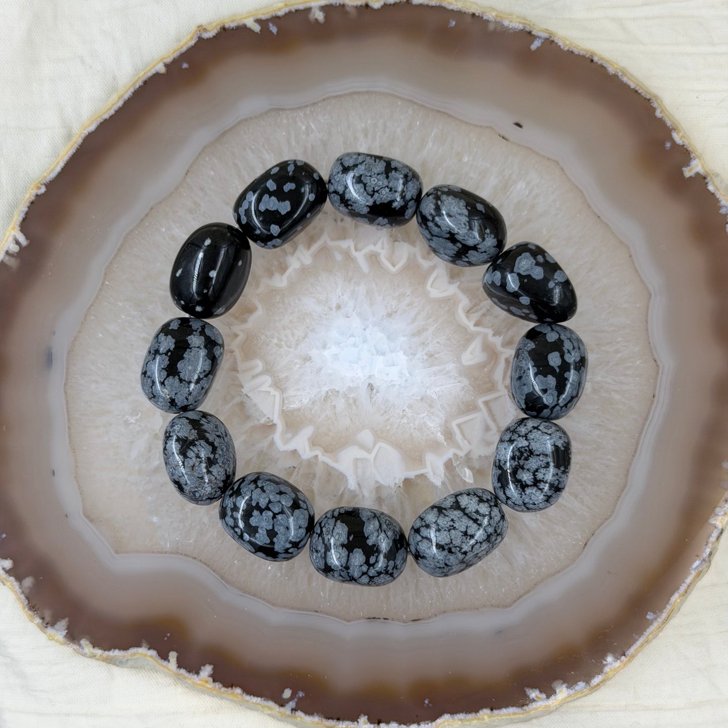 Snaiginio obsidijano apyrankė