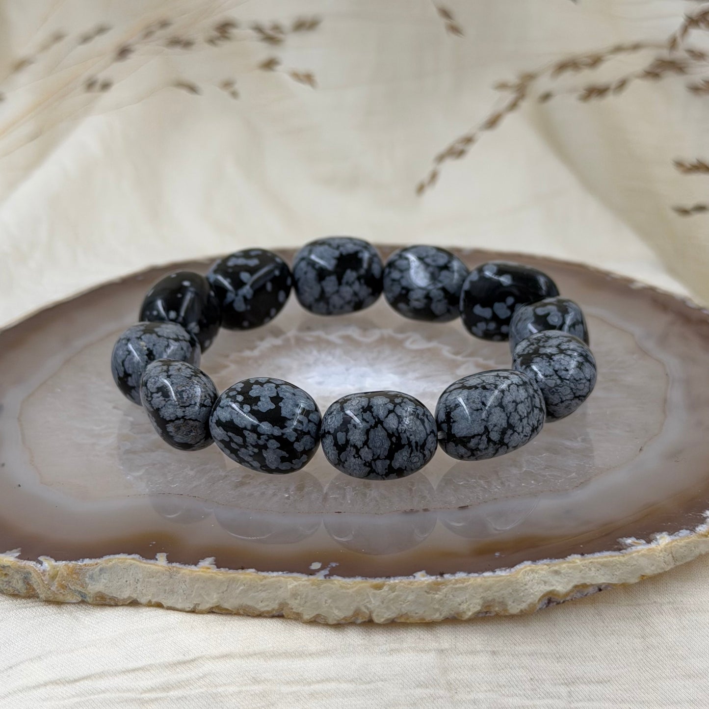 Snaiginio obsidijano apyrankė