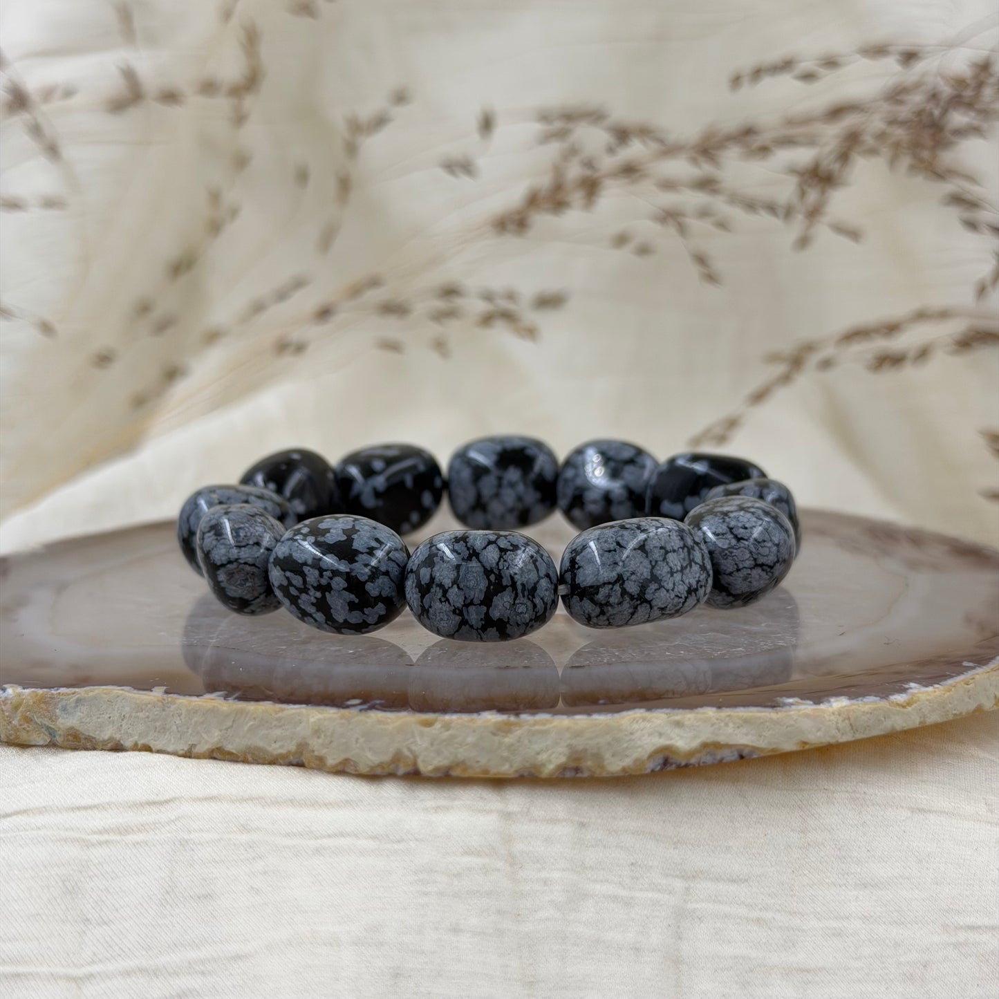 Snaiginio obsidijano apyrankė